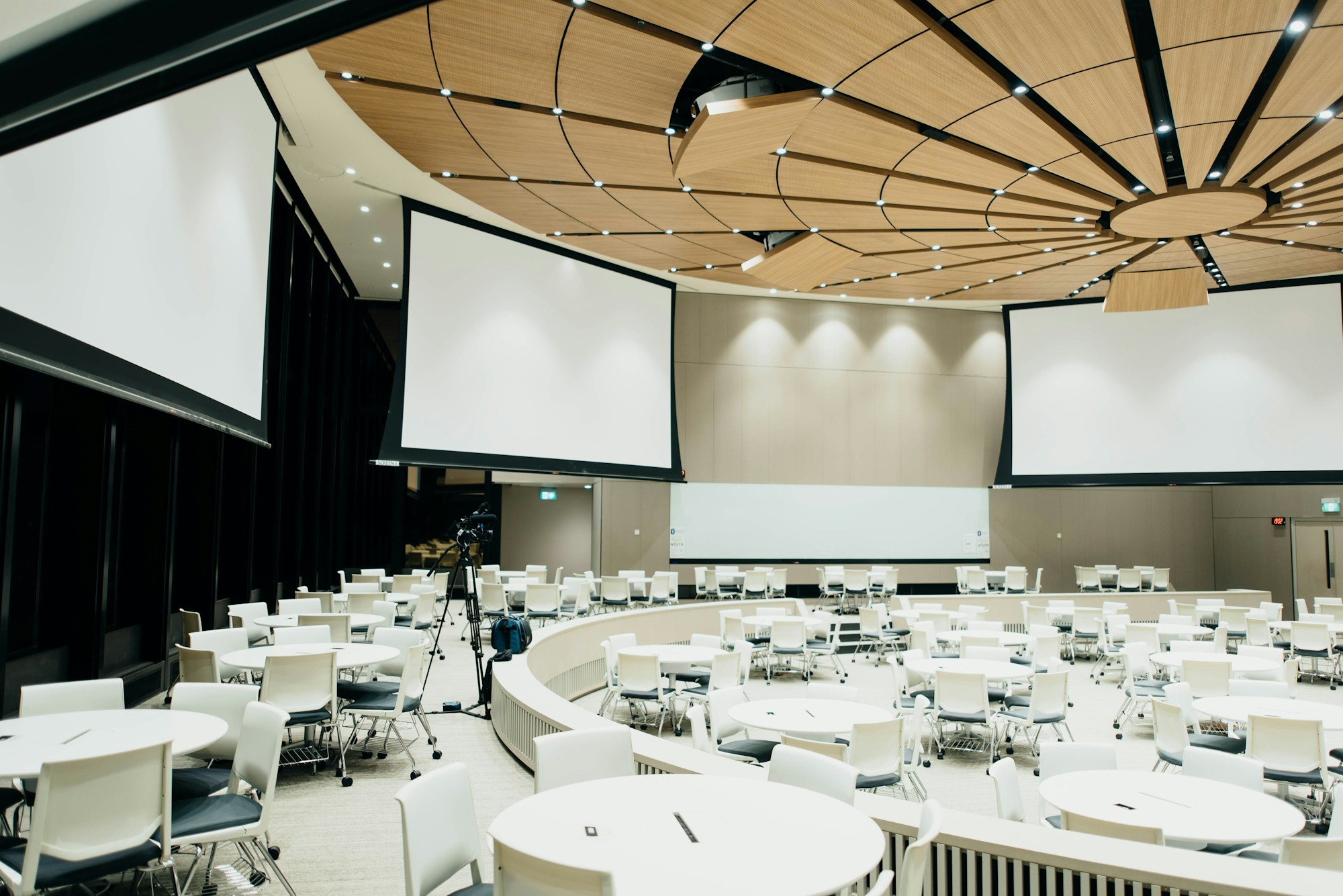 Executive corporate presentation in modern architectural venue