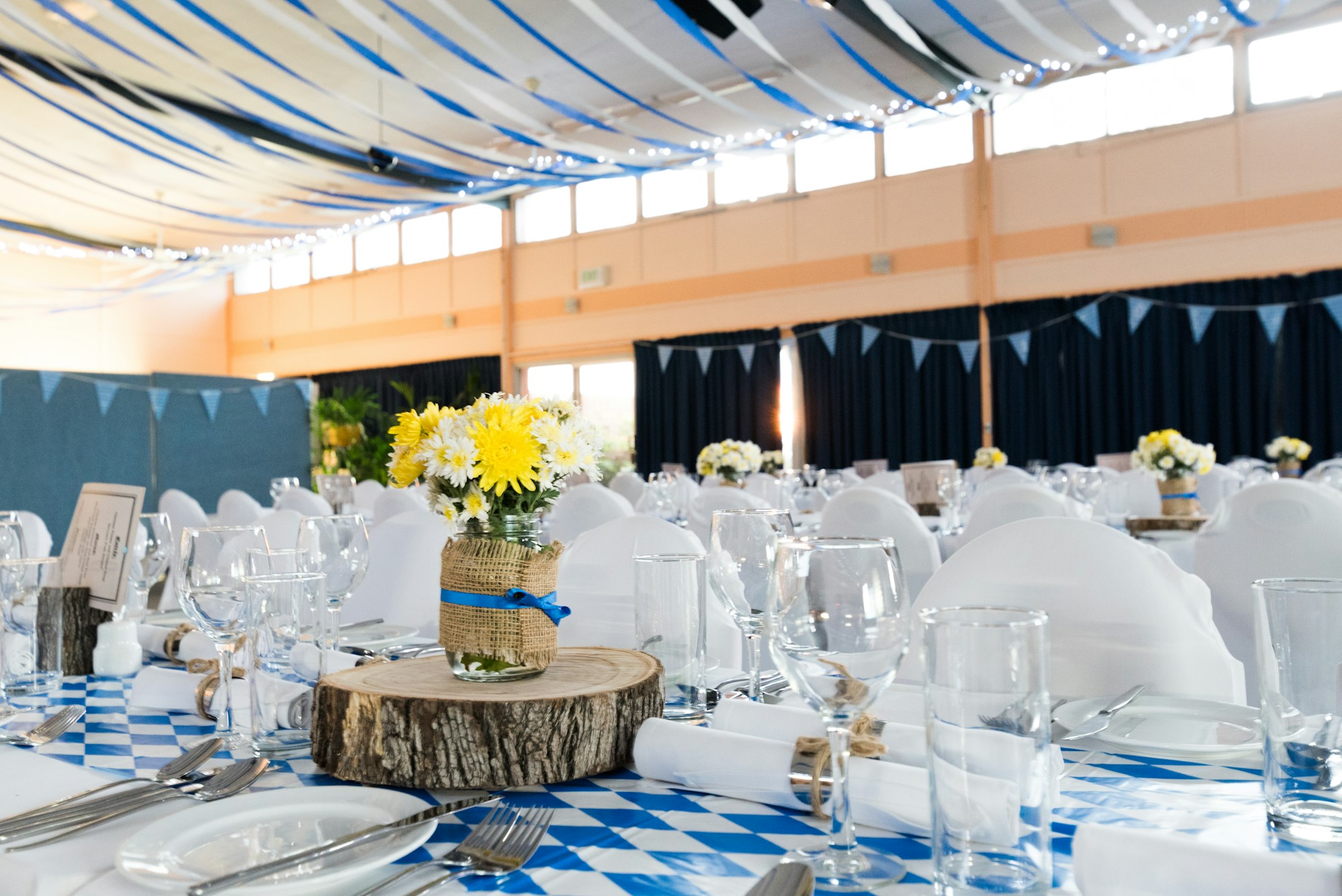 Atmospheric event tablescape with gentle candlelight and flora